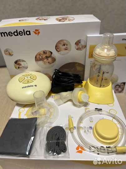 Молокоотсос medela электрический