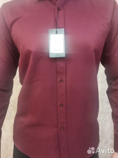 Новые мужские сорочки и костюмы