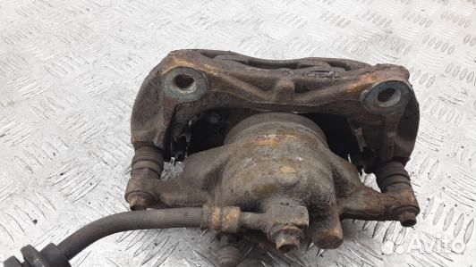 Суппорт тормозной передний правый opel astra J (5L