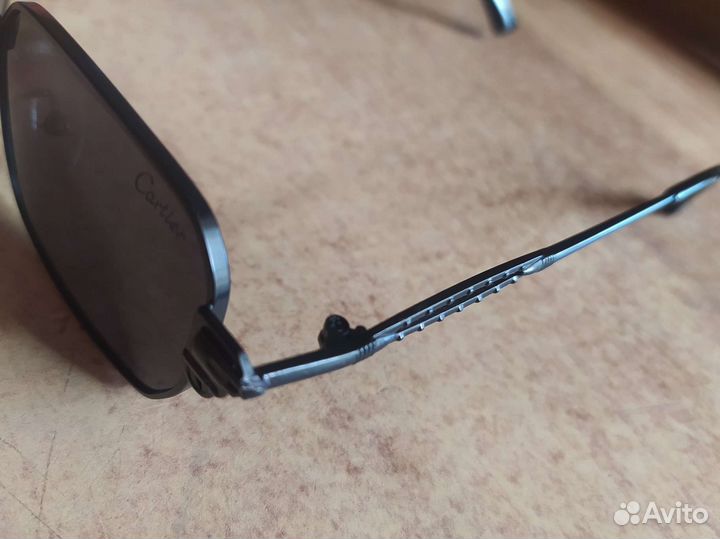 Оригинальные солнцезащитные очки бренда Cartier