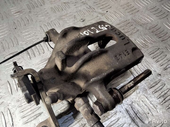 Суппорт задний левый Ford Focus 1