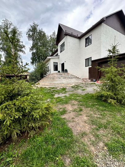 Коттедж 525 м² на участке 15 сот.