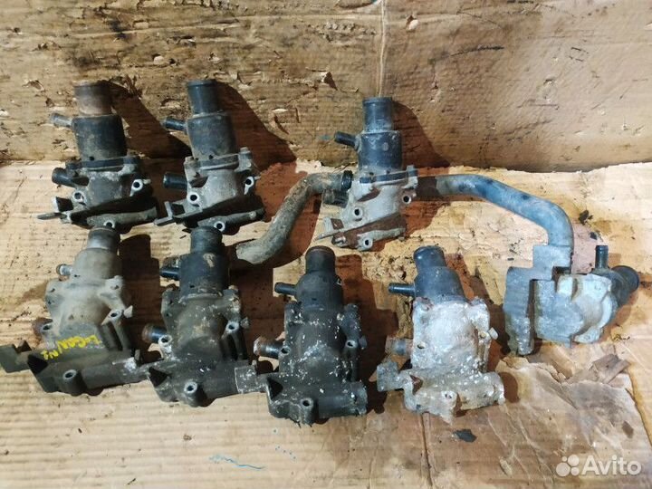 Корпус термостата Renault Logan