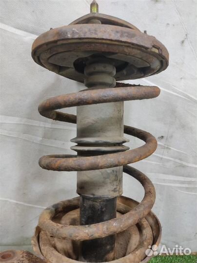 Стойка амортизатора передняя левая Honda CR-V 2