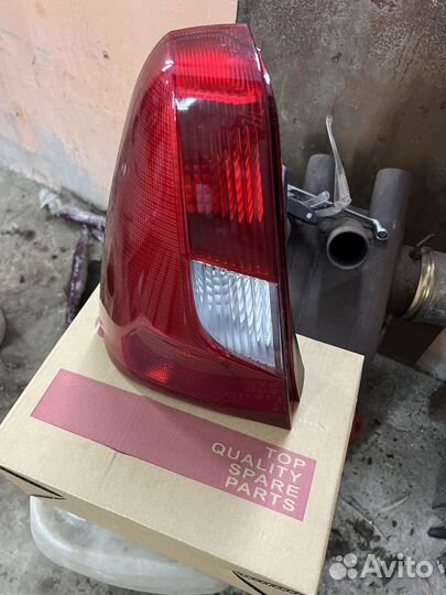 Фонарь задний левый renault logan