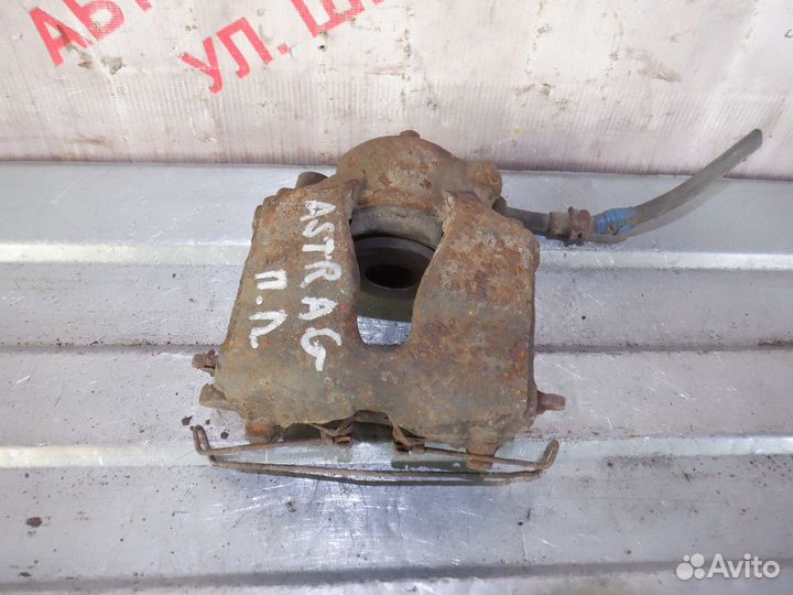 Суппорт передний левый Опель Астра Г