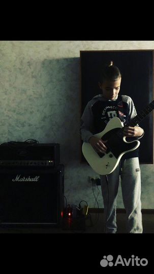 Преподаватель по гитаре