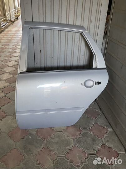 Дверь задняя левая калина