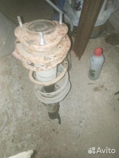 Передние стойки toyota Corolla ae110