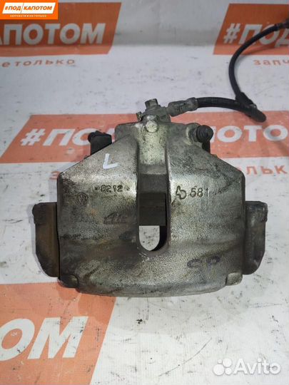 Суппорт тормозной передний левый Volkswagen Golf 5