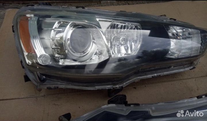 Фары на mitsubishi lancer 10