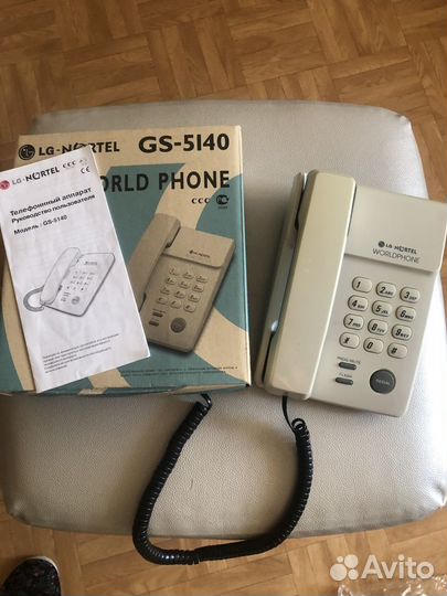 Телефон кнопочный