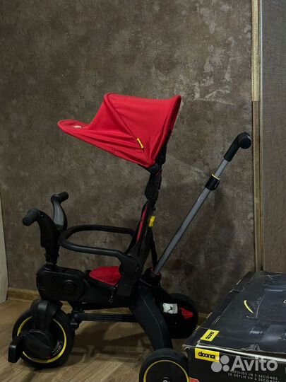 Детский велосипед с ручкой doona liki trike