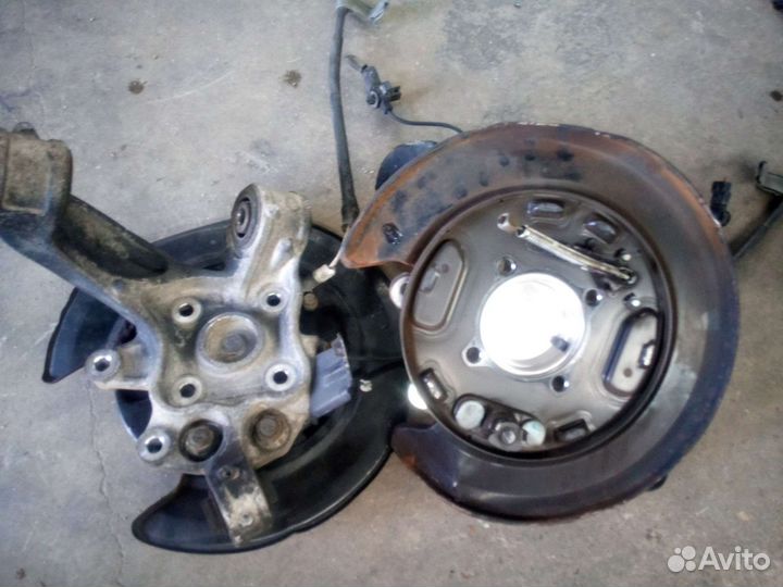 Ступица.Кулак поворотный передний,цапфа задняя