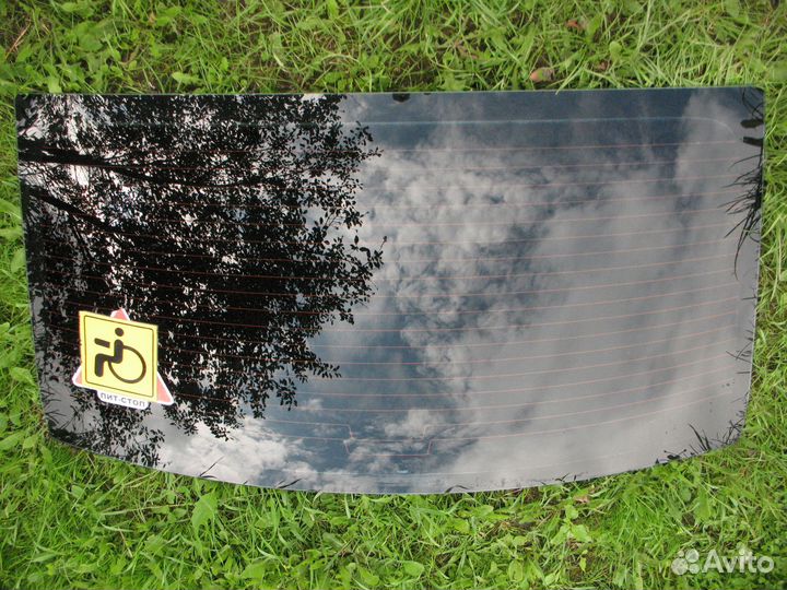 Заднее стекло Renault Logan