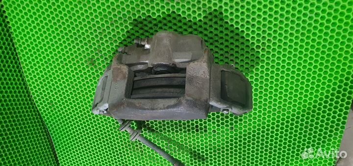 Суппорт тормозной передний правый Chevrolet niva