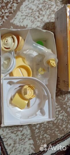 Молокоотсос medela