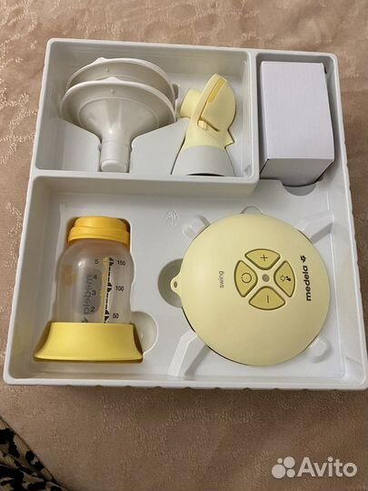 Молокоотсос medela swing flex электрический