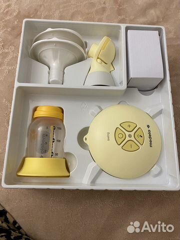 Молокоотсос medela swing flex электрический