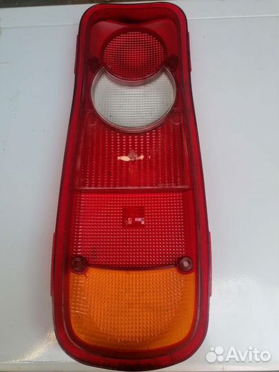 Стекло заднего фонаря для Nissan Cabstar