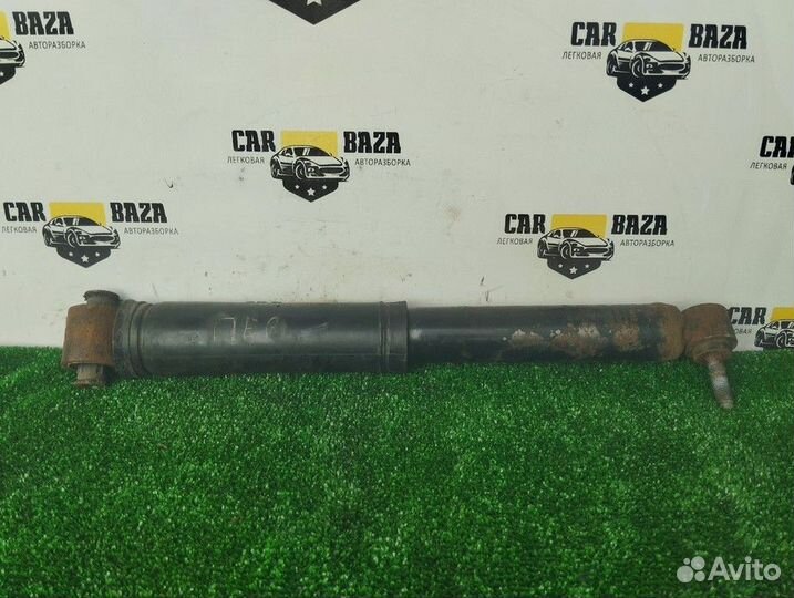 Амортизатор задний левый