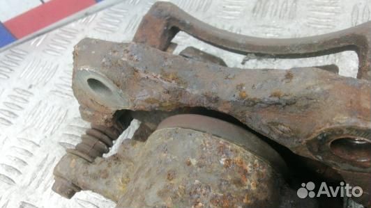 Суппорт тормозной передний левый nissan almera N16