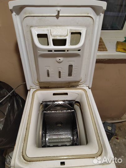 Стиральная машина с вертикальной загрузкой