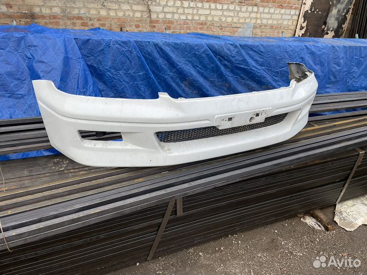 Передний бампер lancer cedia