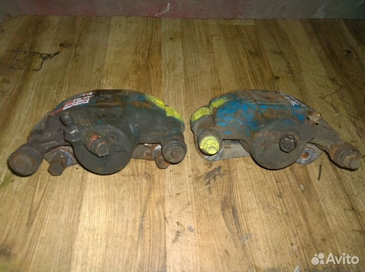 Суппорт предний правый левый toyota corolla ae92