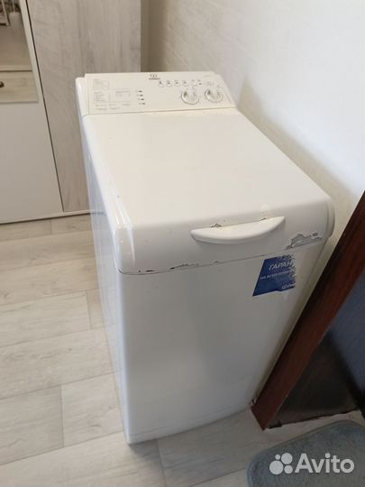 Стиральная машина с вертикальной загрузкой