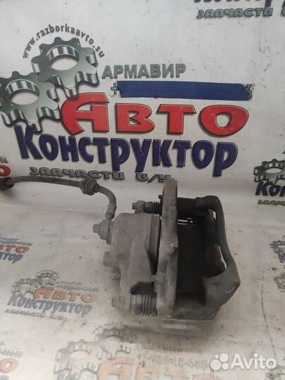 Суппорт тормозной Opel Astra J хэчбек A 16 LET