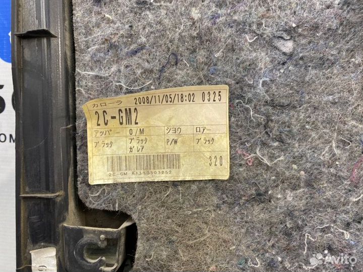 Обшивка двери передняя левая Toyota Corolla E150