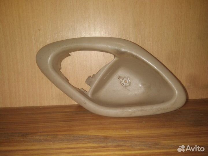 Ручка двери внутренняя передняя левая Mazda