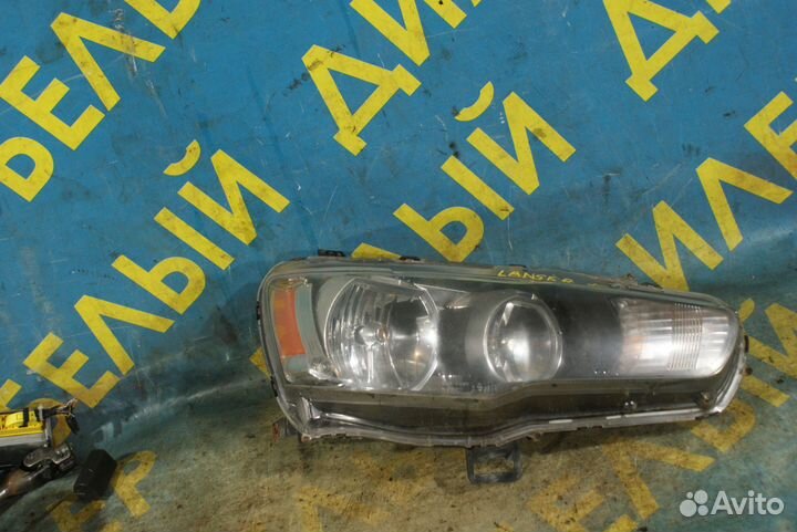 Передняя фара Mitsubishi Lancer X