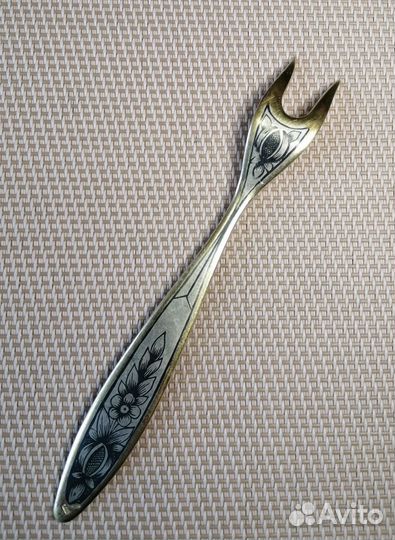 Серебряная вилка для лимона