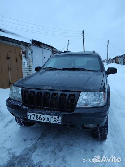 Фара jeep grand Cherokee wj