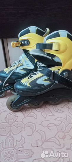 Роликовые коньки