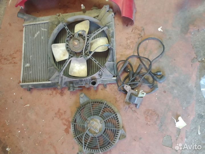 Запчасти на Мазда demio