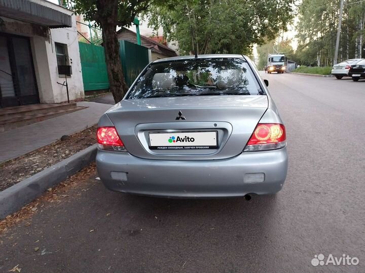 Mitsubishi Lancer 1.3 МТ, 2004, битый, 231 000 км