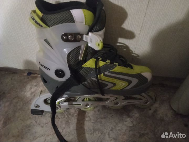 Роликовые коньки