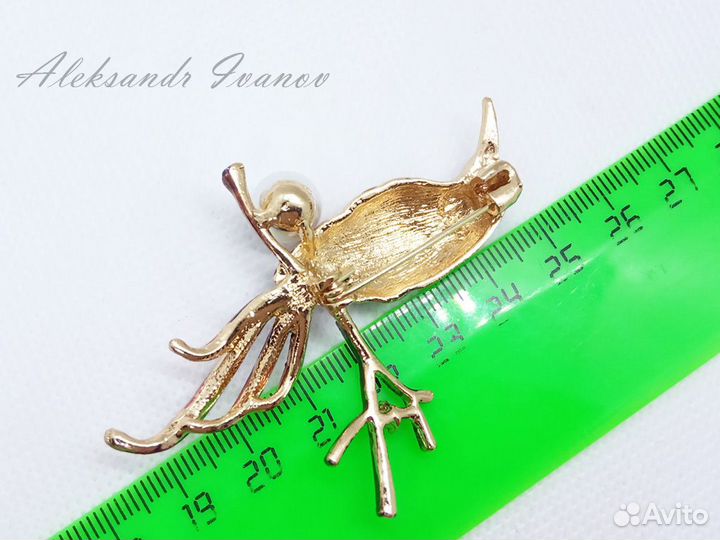 Брошь птица