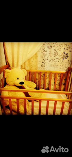 Детская кроватка-маятник