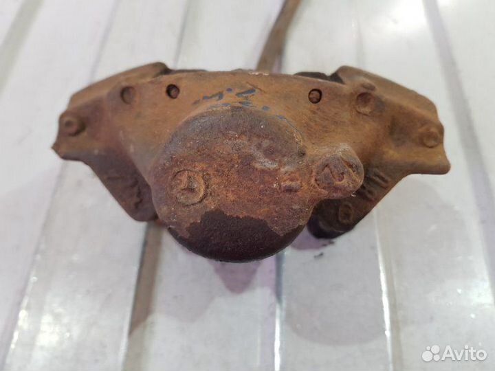 Суппорт тормозной задний левый Mercedes-Benz Е