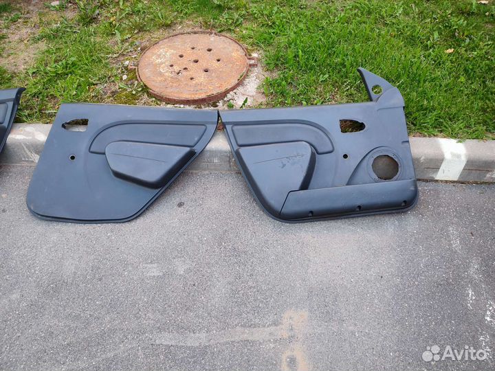Обшивки дверей renault logan