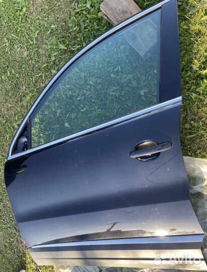 Левая дверь tiguan 1