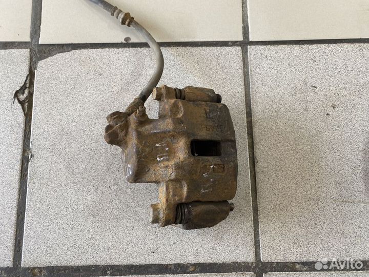 Суппорт передний Mitsubishi Lancer VII