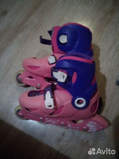 Роликовые коньки