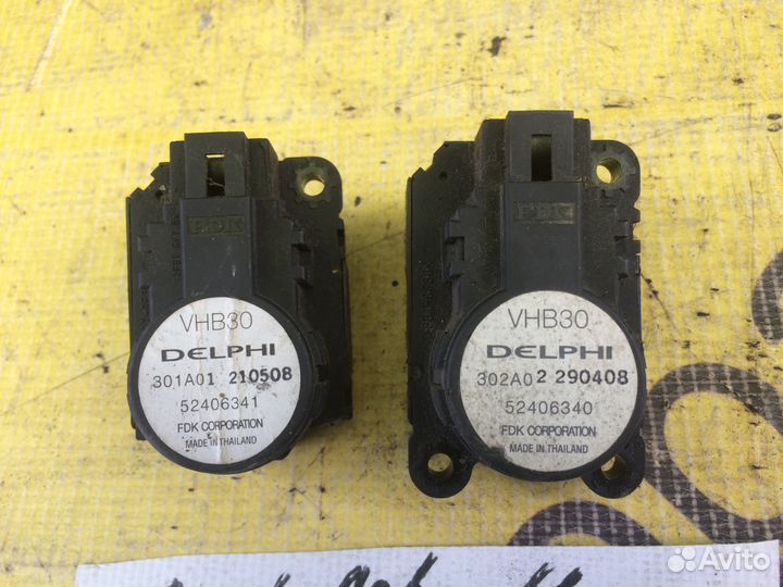 Моторчик заслонки отопителя Opel Astra H