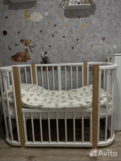 Кроватка для новорожденных с маятником