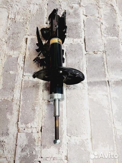 SRX Cadillac амортизатор передний